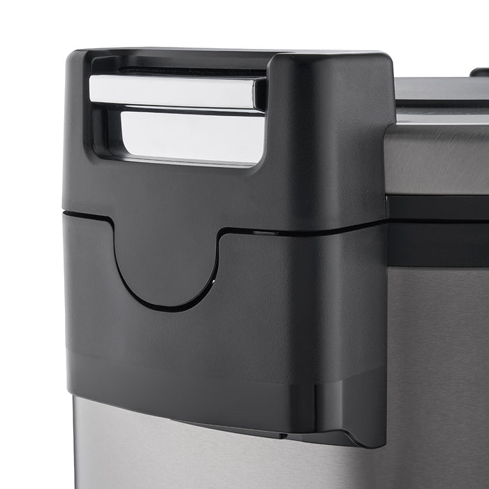 Close-up of a black locking latch mechanism with a silver accent, used to secure the lid of the stainless steel appliance. (CR-3055)