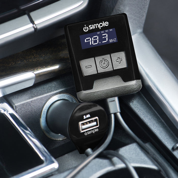 Simple brand FM transmitter plugged into a car cigarette lighter port