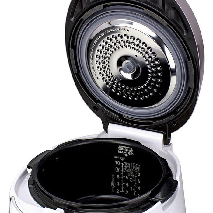 Open CUCKOO rice cooker showing the interior X-wall Diamond coated pot with water level markings and the stainless steel lid. (CRP-P1009S)