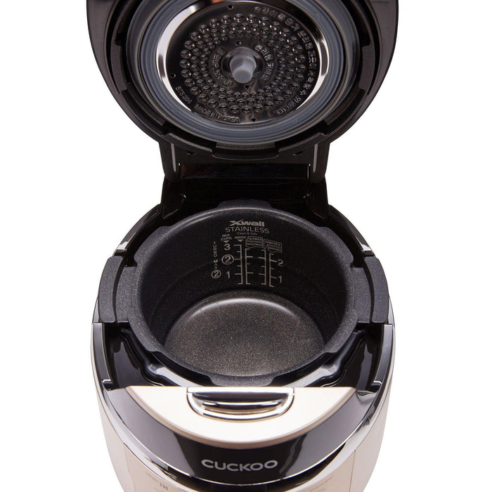 Open CUCKOO rice cooker showing the X-wall stainless steel inner pot with clear water level markings for precise cooking. (CRP-EHSS0309F)