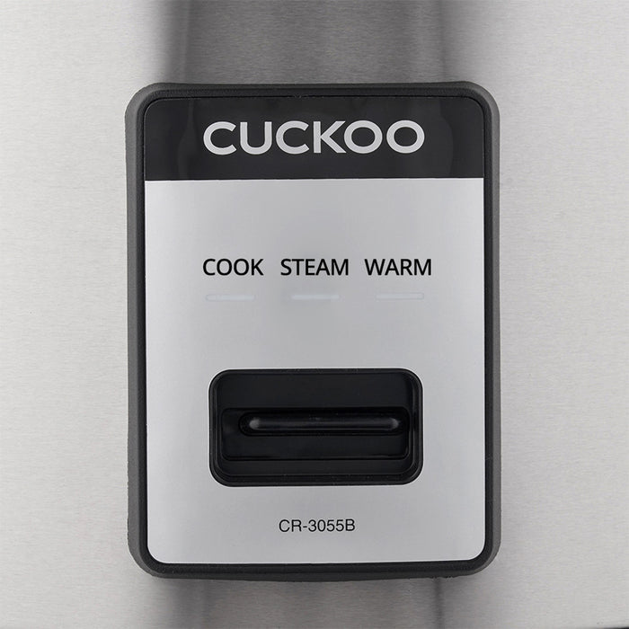 Close-up of Cuckoo control panel showing Cook, Steam, and Warm settings with a central selection switch and model CR-3055B. (CR-3055)