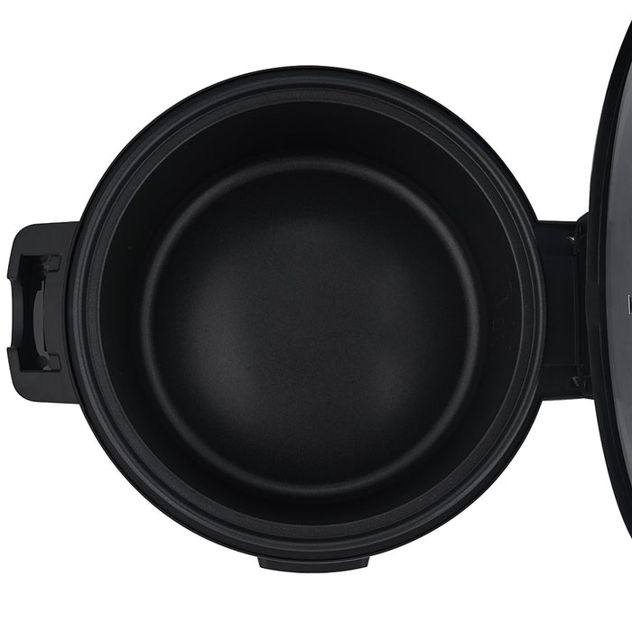 Top-down view of the empty black non-stick inner pot, showing its curved base. (CR-3055)