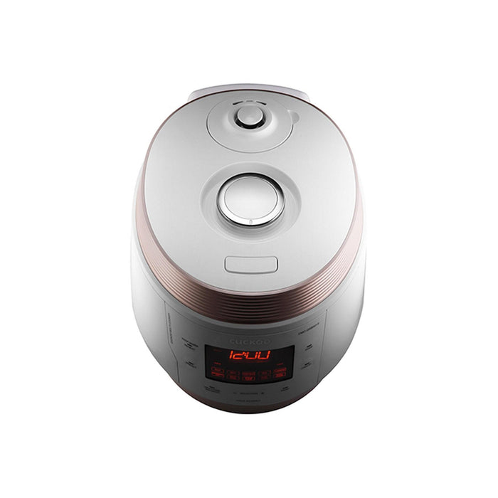 Top-down view of a white and rose gold CUCKOO rice cooker, highlighting the steam valve and the front digital display. (CMC-QSB501S)