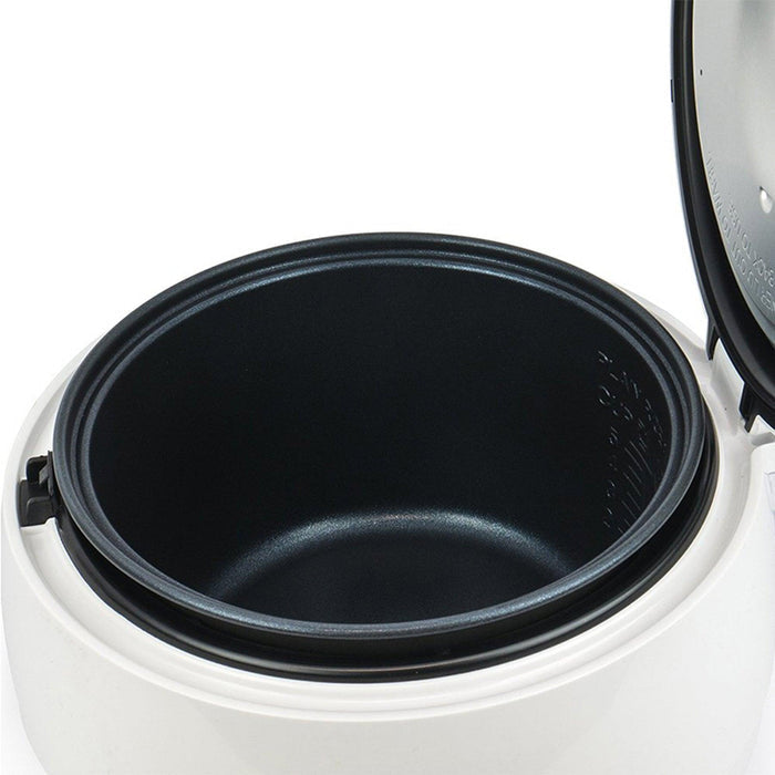 Open Cuckoo rice cooker showing the interior non-stick cooking pot with clear water level markings for easy measurement. (CR-0671V)