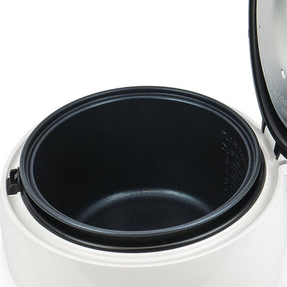 Open Cuckoo rice cooker showing the interior non-stick cooking pot with clear water level markings for easy measurement. (CR-0671V)