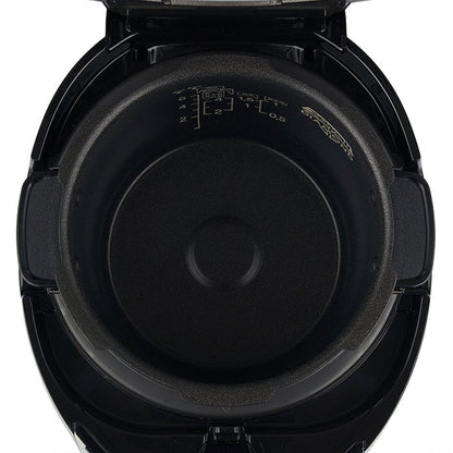 Top-down view inside a CUCKOO rice cooker, showing non-stick inner pot with water level markings and Diamond coating. (CRP-P0609S)