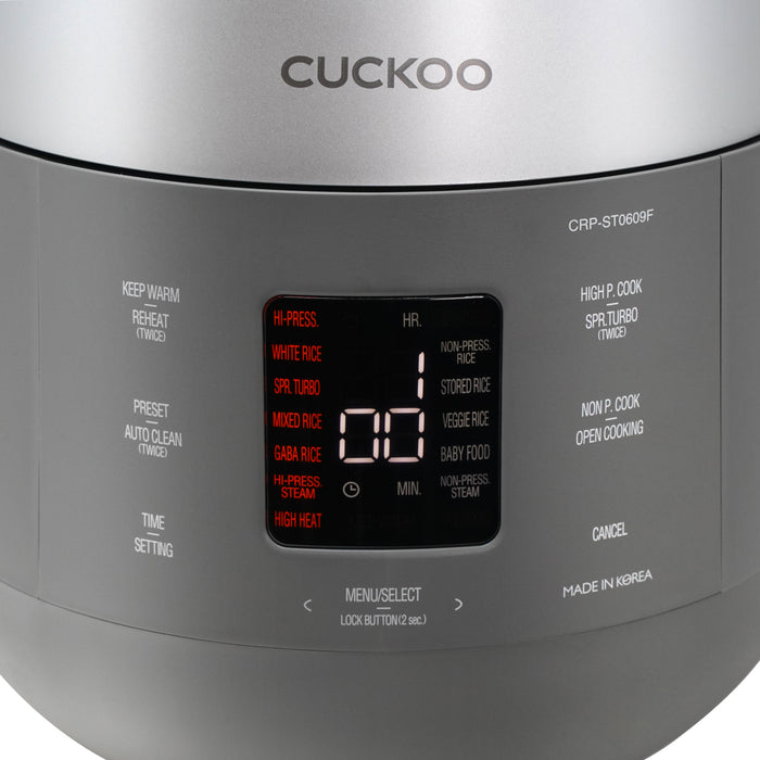 Close-up of Cuckoo rice cooker CRP-ST0609F front control panel with digital LED menu display and cooking settings. (CRP-ST0609F)