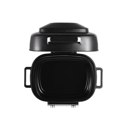 Top-down view of the Cuckoo 6QT Countertop Air Fryer with its lid open, displaying the empty, spacious black cooking pot. (CAFG-A0601S)