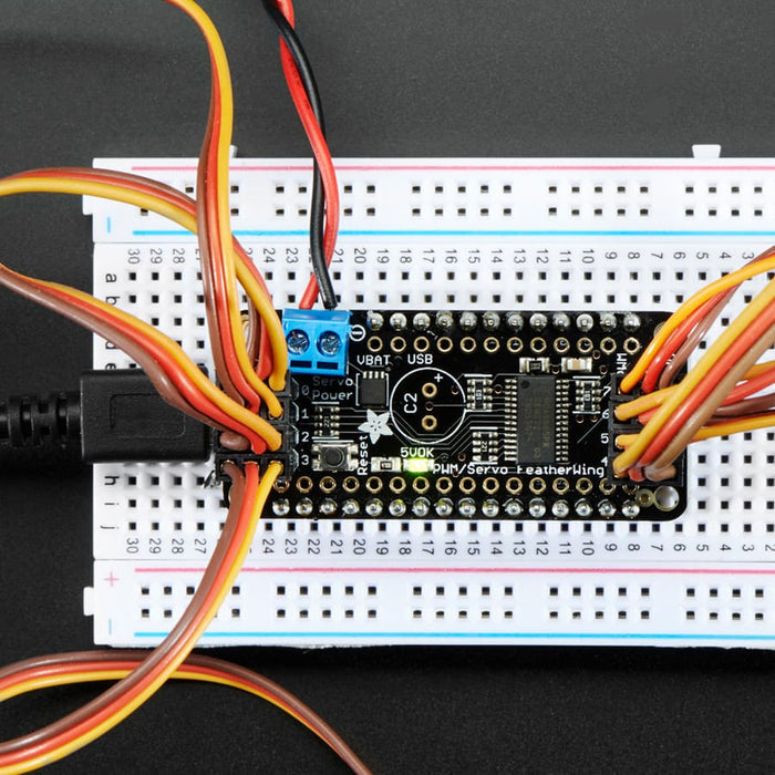 8-Channel PWM or Servo FeatherWing add-on for all Feather Boards by Adafruit - The Pi Hut