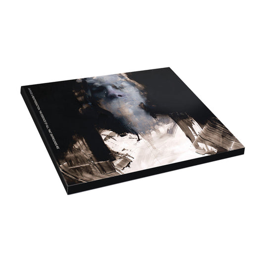 A square Capsize canvas with black sides features abstract brushstrokes in dark brown, white, and blue—evoking the moody vibe of a post-hardcore album cover. The striking artwork is photographed on a plain white background.