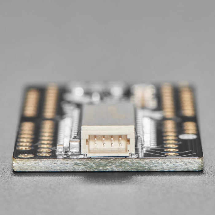Adafruit 14-Segment Alphanumeric LED FeatherWing by Adafruit - The Pi Hut