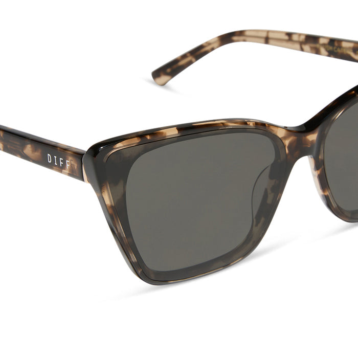 diff eyewear featuring the alina cat eye sunglasses with a espresso tortoise frame and grey lenses detailed view