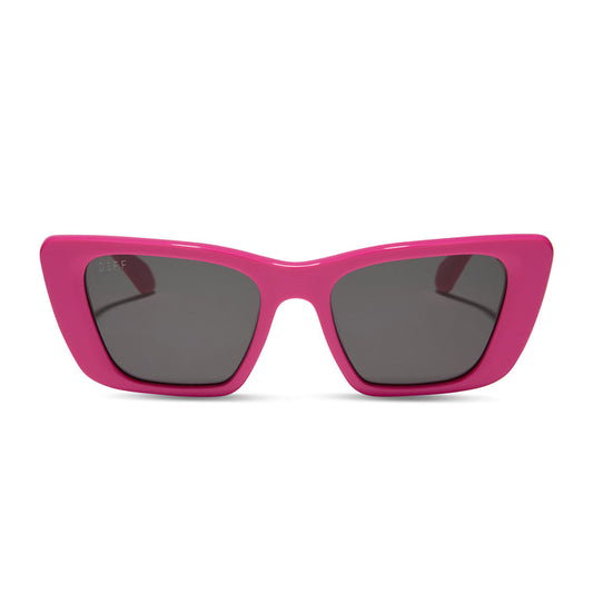 diff eyewear featuring the aura cat eye sunglasses with a bright pink frame and grey lenses front view