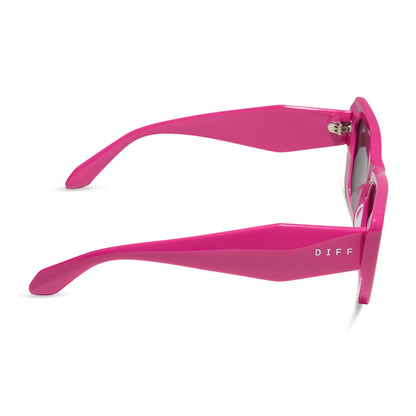 diff eyewear featuring the aura cat eye sunglasses with a bright pink frame and grey lenses side view