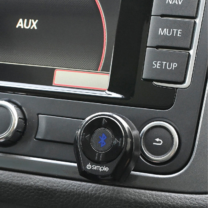 Bluetooth car adapter mounted on a vehicle dashboard console
