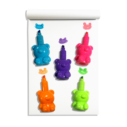 Individual OOLY Bear Besties Stacking Highlighters on a white sketchbook showing bear shaped color swatches