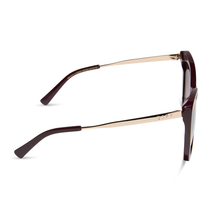 diff eyewear featuring the becky ii cateye sunglasses with a dark cherry lacquer frame and dark cherry gradient polarized lenses side view