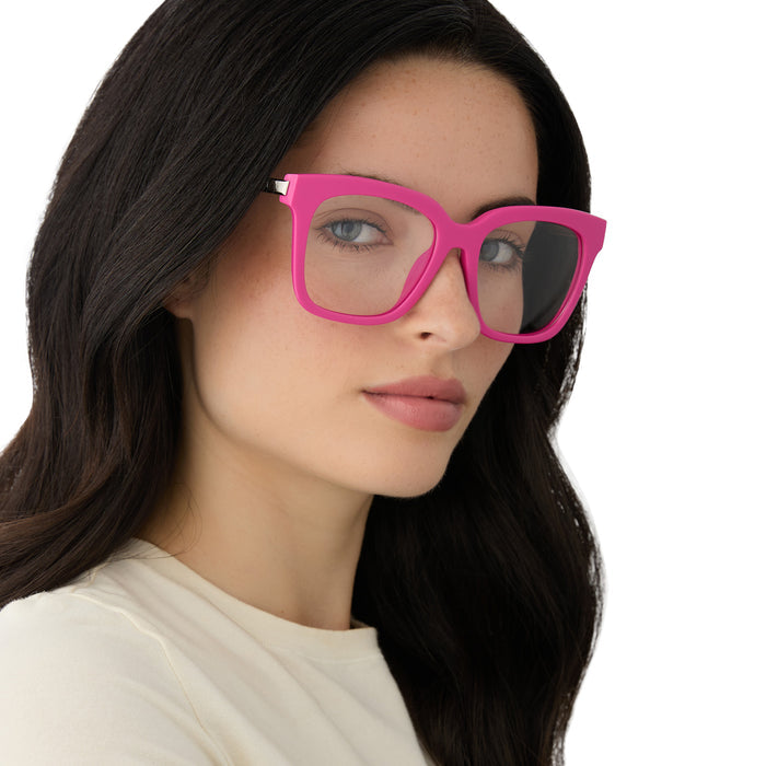 on model - female wearing diff eyewear featuring the bella square prescription glasses with a bright pink frame angled view