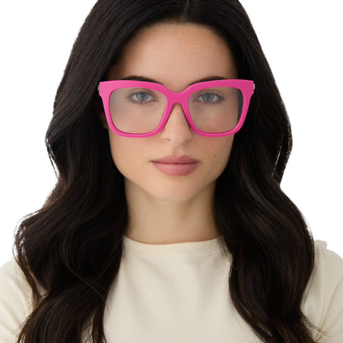 on model - female wearing diff eyewear featuring the bella square prescription glasses with a bright pink frame front view