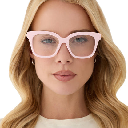 on model - blonde female wearing diff eyewear featuring the bella xs square prescription glasses with a powder pink with gold frame front view