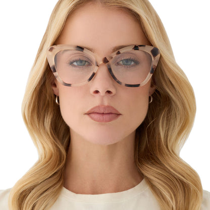 on model - blonde female wearing diff eyewear featuring the betty cat eye prescription glasses with a cream tortoise frame front view
