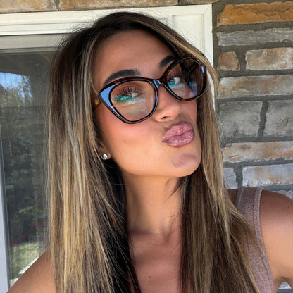 lifestyle - madison quinn wearing cat eye tortoise eyeglasses