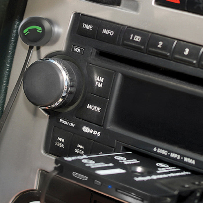 Bluetooth cassette adapter inserted into a car stereo