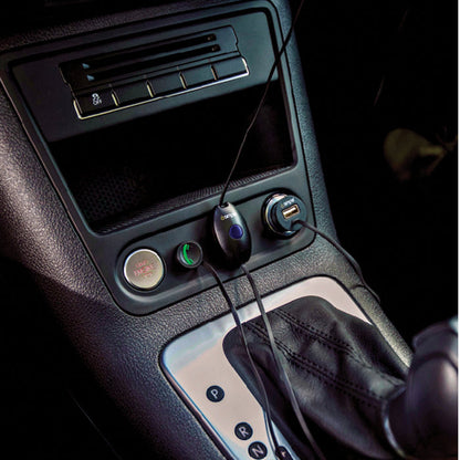 Bluetooth hands free car kit plugged into vehicle console