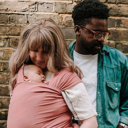 A Boba Classic Baby Wrap, made from a soft 95% French Terry cotton blend and 5% Spandex. Ergonomic, award-winning design fits babies from 7 Ibs to 35 Ibs, best up to 20 Ibs. Machine washable, dryer friendly, and certified hip-healthy. Dusty Pink