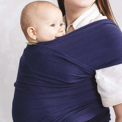A Boba Classic Baby Wrap, made from a soft 95% French Terry cotton blend and 5% Spandex. Ergonomic, award-winning design fits babies from 7 Ibs to 35 Ibs, best up to 20 Ibs. Machine washable, dryer friendly, and certified hip-healthy. Navy Blue
