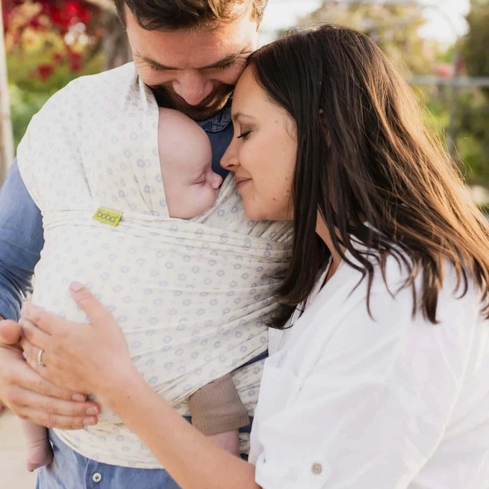 A Boba Serenity Baby Wrap, made from a buttery soft, extra breathable bamboo blend fabric (68% Viscose from Bamboo, 25% Cotton, 7% Spandex). Ergonomic, award-winning design fits babies from 7 Ibs to 35 Ibs, best up to 20 Ibs. Machine washable, dryer friendly, and certified hip-healthy. Anvi