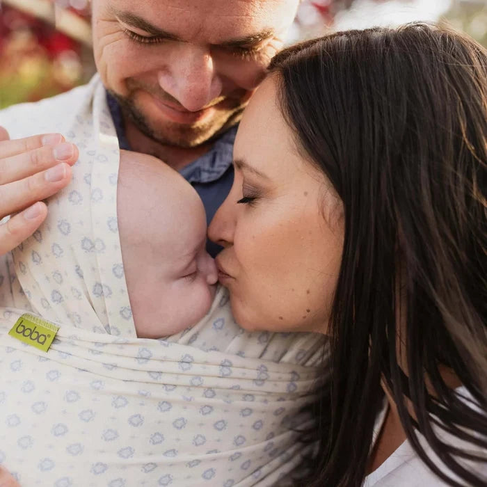 A Boba Serenity Baby Wrap, made from a buttery soft, extra breathable bamboo blend fabric (68% Viscose from Bamboo, 25% Cotton, 7% Spandex). Ergonomic, award-winning design fits babies from 7 Ibs to 35 Ibs, best up to 20 Ibs. Machine washable, dryer friendly, and certified hip-healthy. Anvi