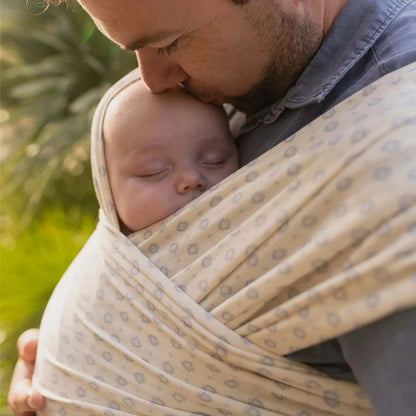 A Boba Serenity Baby Wrap, made from a buttery soft, extra breathable bamboo blend fabric (68% Viscose from Bamboo, 25% Cotton, 7% Spandex). Ergonomic, award-winning design fits babies from 7 Ibs to 35 Ibs, best up to 20 Ibs. Machine washable, dryer friendly, and certified hip-healthy. Anvi