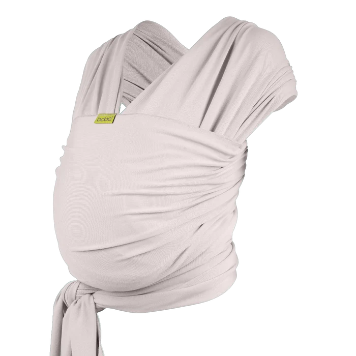 A Boba Serenity Baby Wrap, made from a buttery soft, extra breathable bamboo blend fabric (68% Viscose from Bamboo, 25% Cotton, 7% Spandex). Ergonomic, award-winning design fits babies from 7 Ibs to 35 Ibs, best up to 20 Ibs. Machine washable, dryer friendly, and certified hip-healthy. Organic Stone