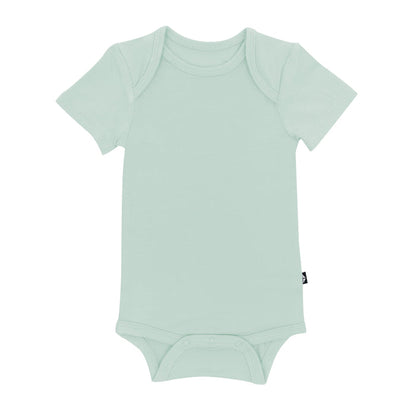 Flat lay of Kyte Baby Short Sleeve Bodysuit in Sage