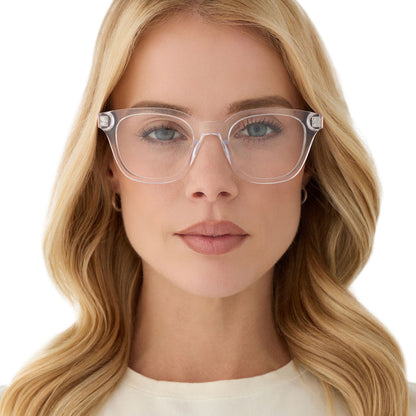 on model - female wearing diff eyewear featuring the bridget round prescription glasses with a clear with gold frame front view