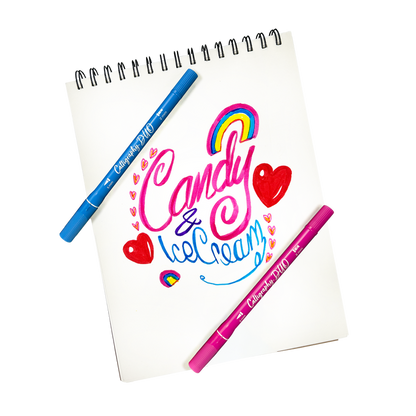 Stylized hand lettering that says "Candy & Ice Cream" on a white pad made with OOLY Calligraphy Duo Double-Ended Markers