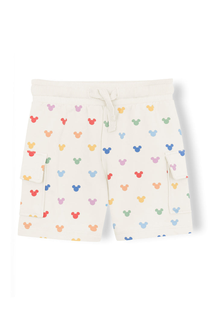 Cargo shorts with pastel mickey mouse pattern on an oat background