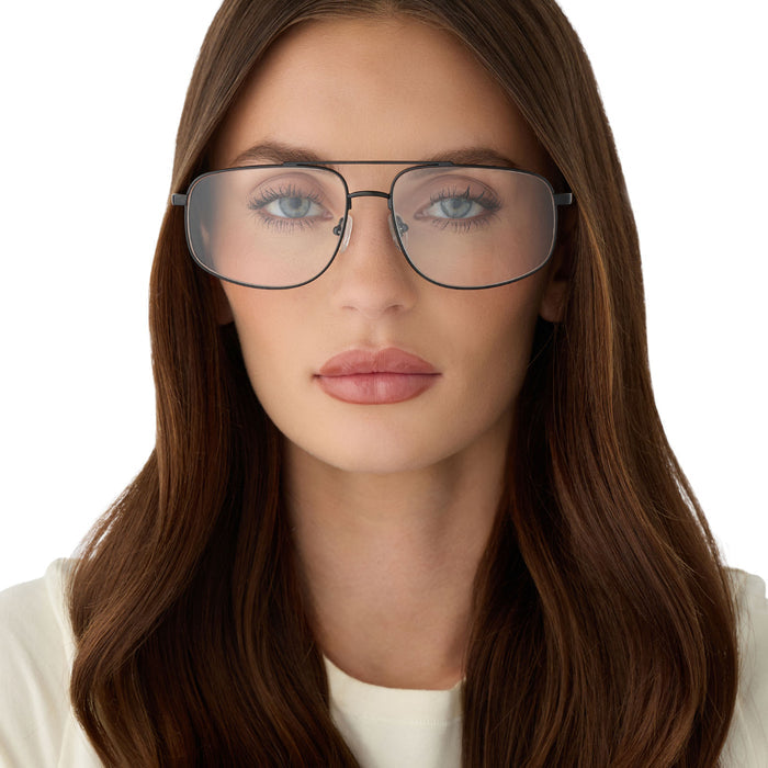 on model - female wearing diff eyewear featuring the charley navigator glasses with a shiny black frame front view