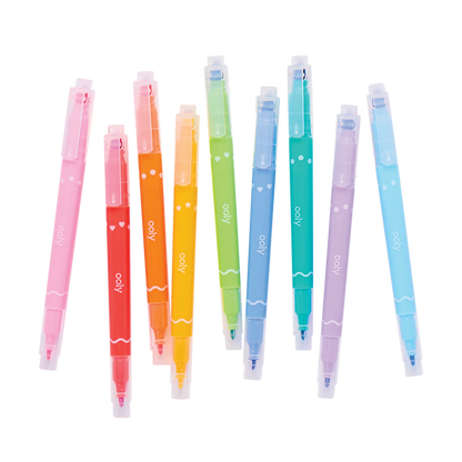 Scattered row of capped OOLY Confetti Stamp Double-Ended Markers