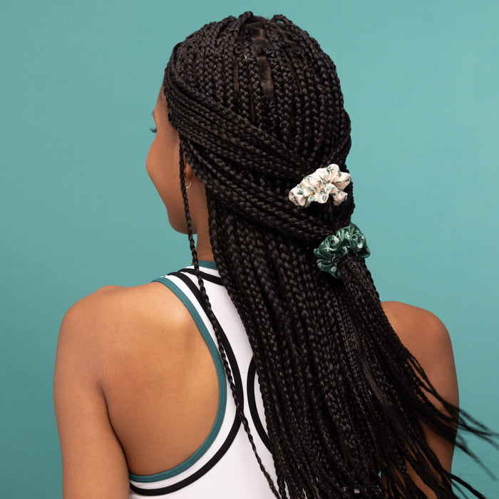 KITSCH Ruched Satin Scrunchies 5pc Set – Cream, Court Green & Navy Blue — model wearing a ruched satin scrunchie — tennis-print satin in cream, court green, and navy blue adds texture and volume