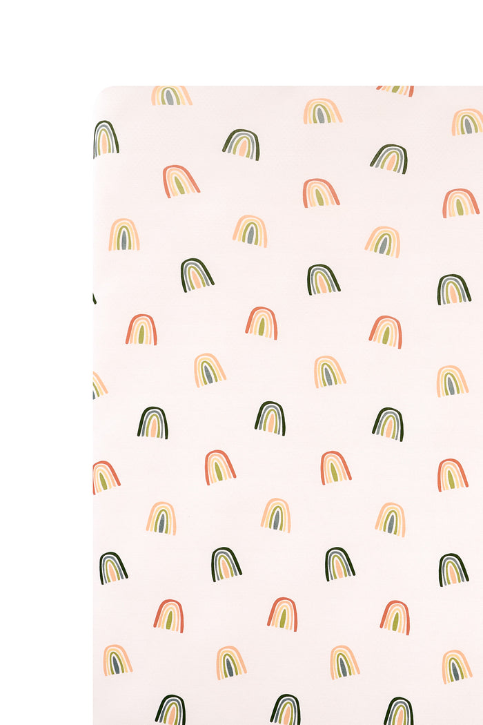 Vanilla cream Crib Sheet in Retro Rainbow print on a white background