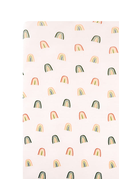 Vanilla cream Crib Sheet in Retro Rainbow print on a white background