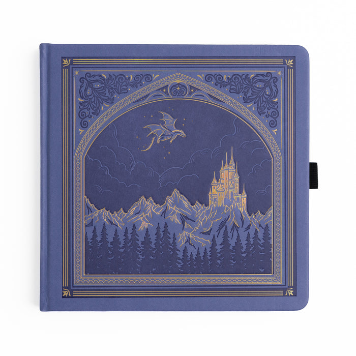 Periwinkle notebook with a castle and dragon design on the cover