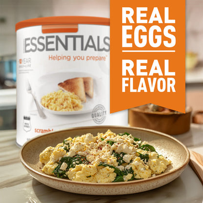 Scrambled eggs with greens on a plate next to eggs can packaging