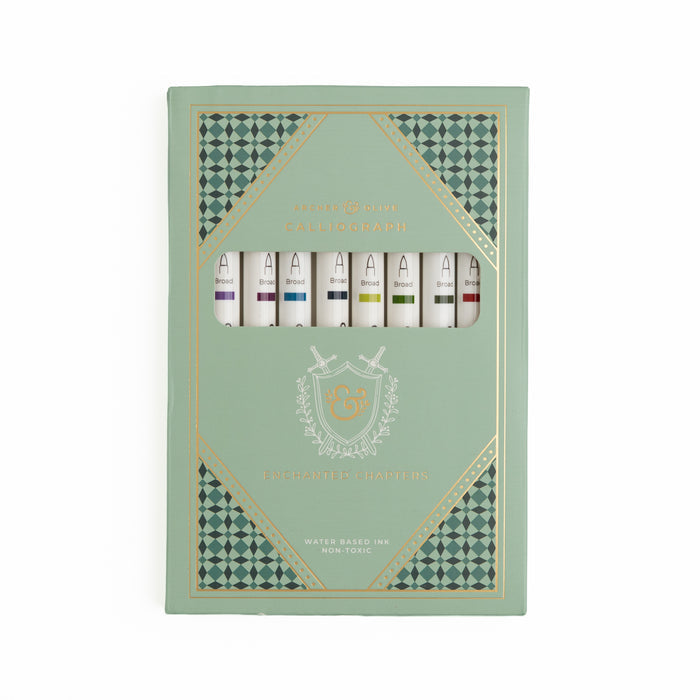 Set of calliographs in a decorative green box with geometric patterns