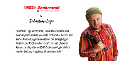 Ein Mann mit grüner Mütze und beigem Hemd hält den Unold ESGE-Zauberstab E 120 Select + Magic Fusion Anthrazit Mixer. Der deutsche Text hebt die Empfehlung des Fernsehkochs Sebastian Lege und die einzigartige Qualität des Produkts hervor.