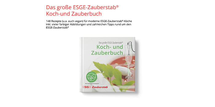 Cover von „Das große ESGE-Zauberstab Koch- und Zauberbuch“ mit frischen Kräutern und dem weißen Stabmixer ESGE-Zauberstab® Petticoat Edition von Unold vor grünem Blätterhintergrund, mit sichtbaren Buch- und Produktlogos.