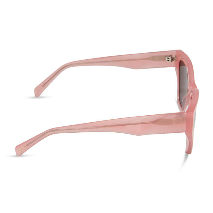 diff eyewear featuring the evie cat eye sunglasses with a peach frame and brown polarized lenses side view