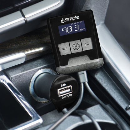 Simple brand FM transmitter plugged into a car cigarette lighter port